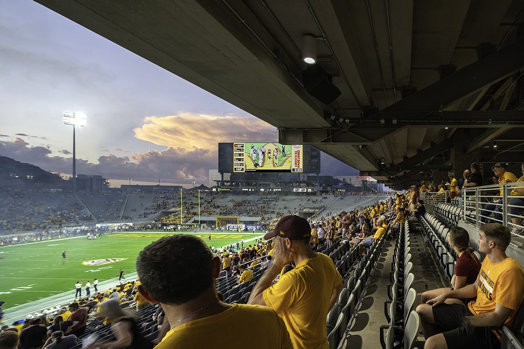 Fans watch a game at ASU Sun Devil Stadium
