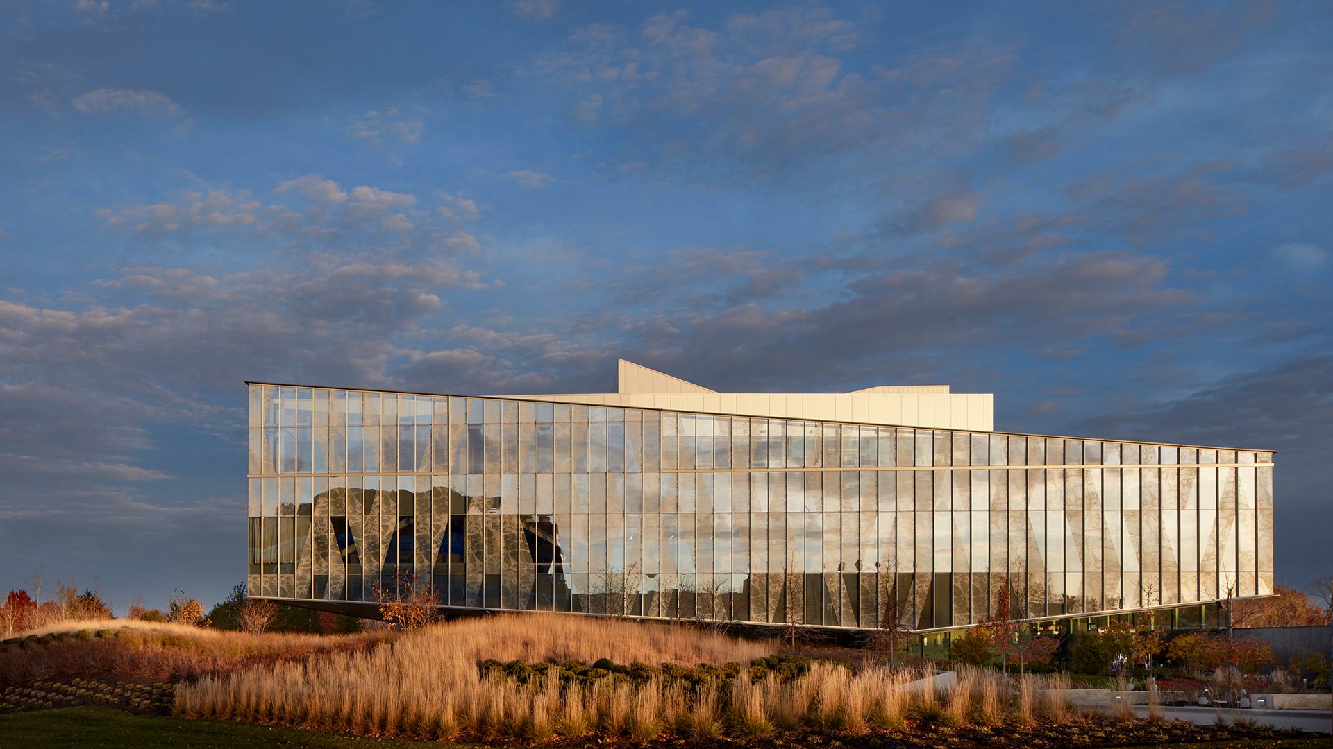 Image of the Engagement Center building with surrounding autumn colored landscape.