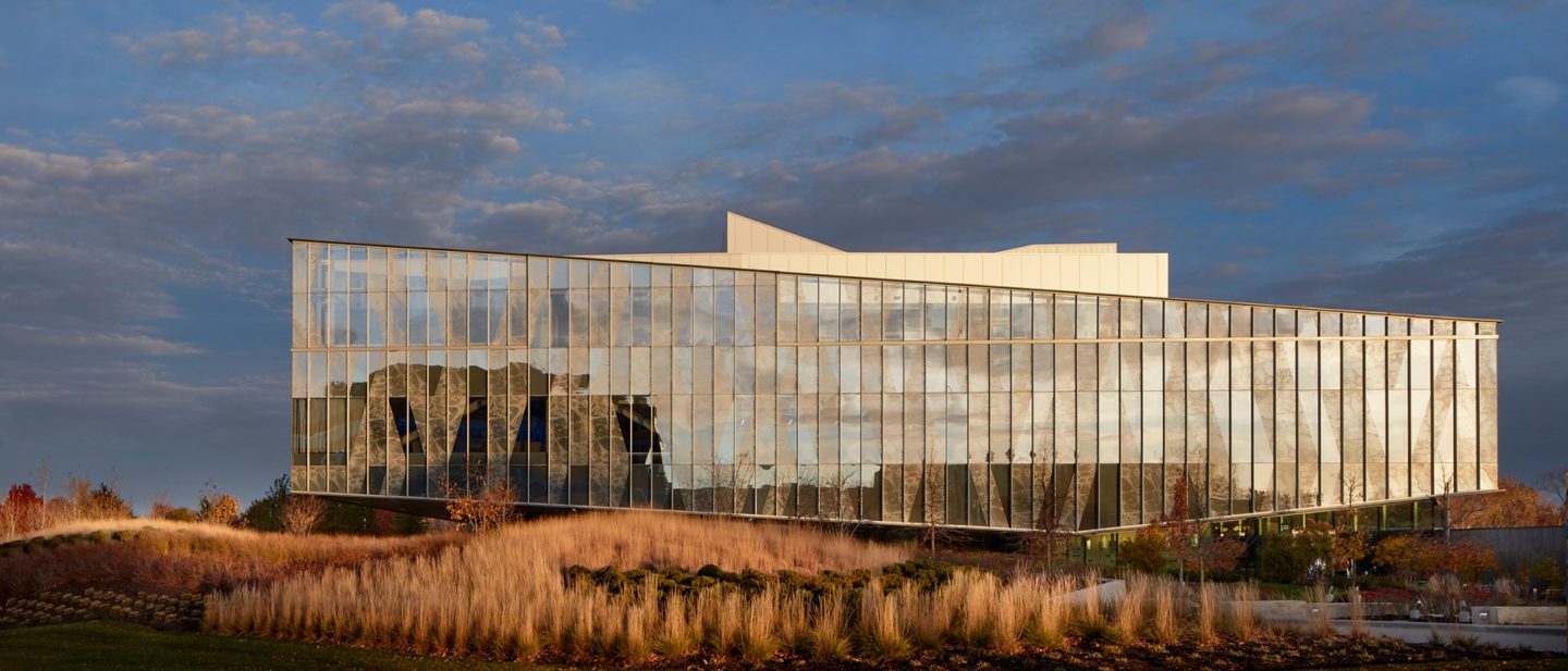 Image of the Engagement Center building with surrounding autumn colored landscape.