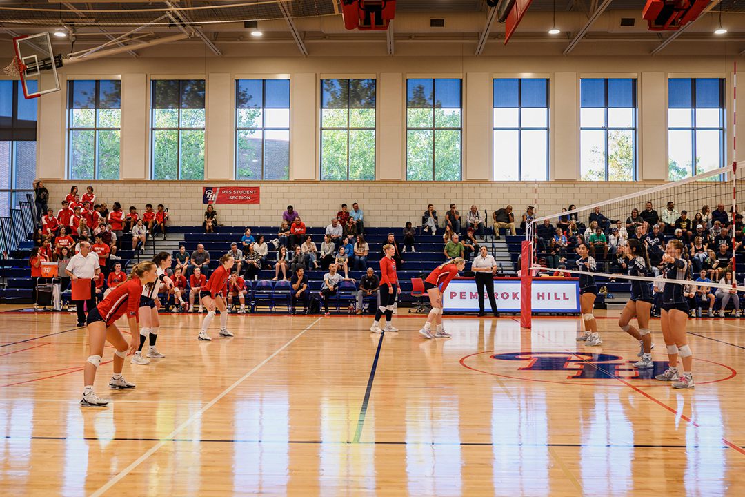 Photo of a volleyball game being played on the courts within Bellis Athletics Center.